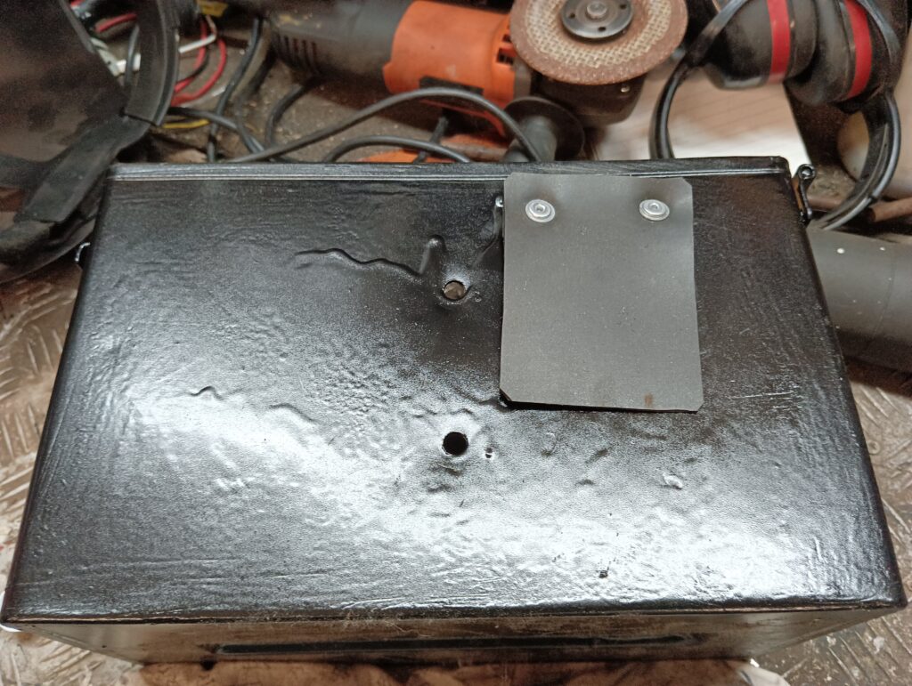 And drilled a couple of holes and painted them badly